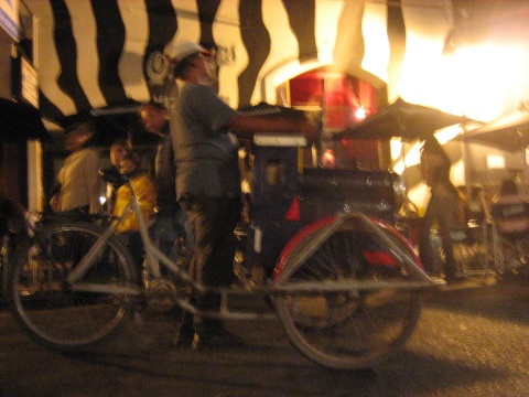This guy pushed around a miniature steam engine, and tooted its whistle as he passed by.  We never did find out what he was selling.