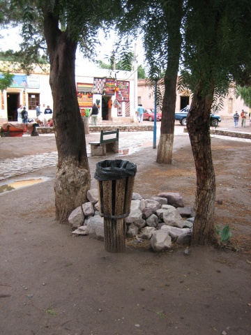 Pumamarca town square.  The garbage can is made from cactus wood.